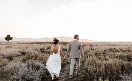 Wedding couple captured by Liezel Volschenk Photography at Cherry Glamping 