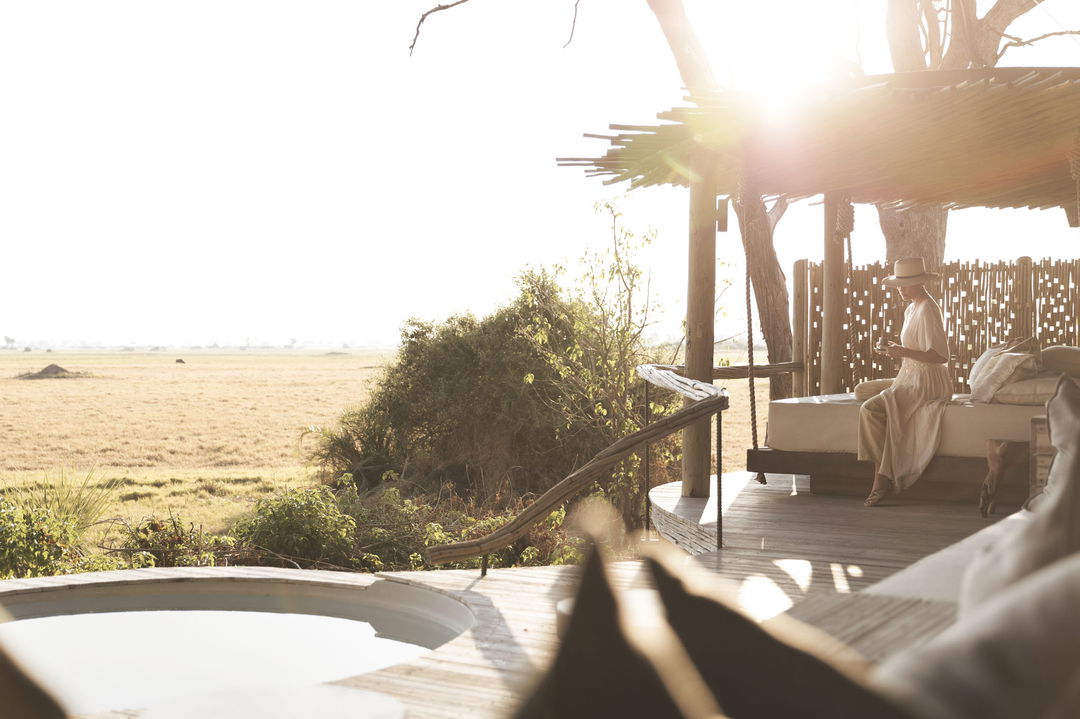 patio with pool at a room at Wilderness Mombo Camp in the Okavango Delta