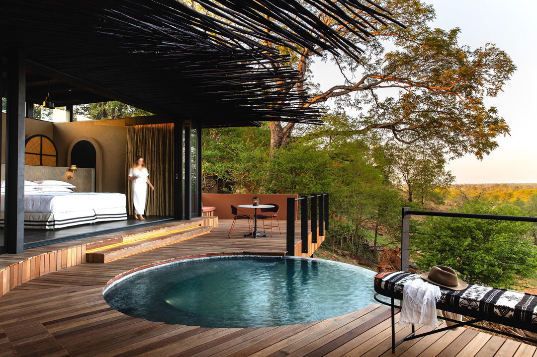 splash pool on deck of vista suite by Chichele Presidential Camp Zambia