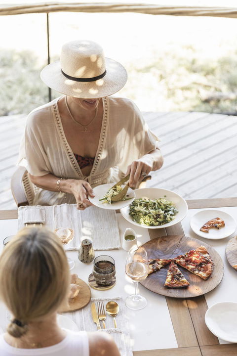 lady having lunch at Mombo camp Botswana