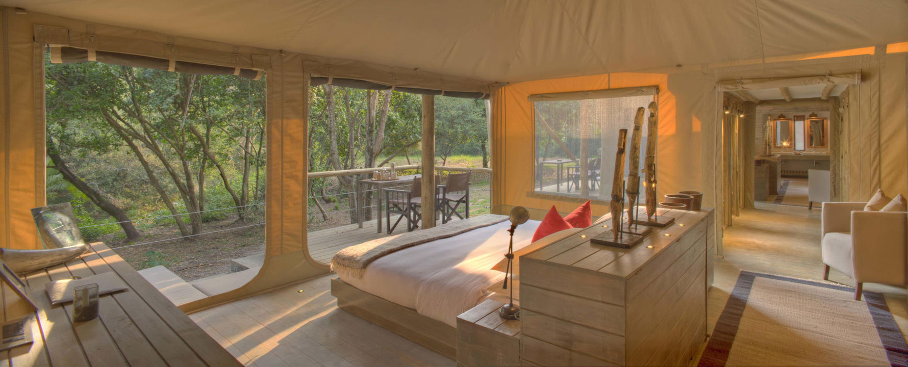 inside bedroom of tented suite at andBeyond Kichwa Tembo Camp Kenya Masai Mara