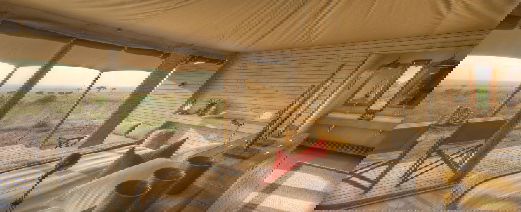 superior view bedroom of suite at andBeyond Kichwa Tembo Camp Kenya Masai Mara