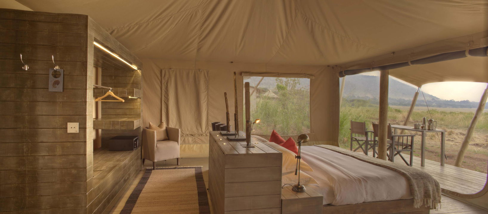 bedroom of standard suite at andBeyond Kichwa Tembo Camp Kenya Masai Mara