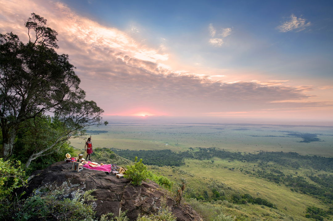 Masai man by picnic spot on a kopje by Angama Mara Kenya Masai Mara