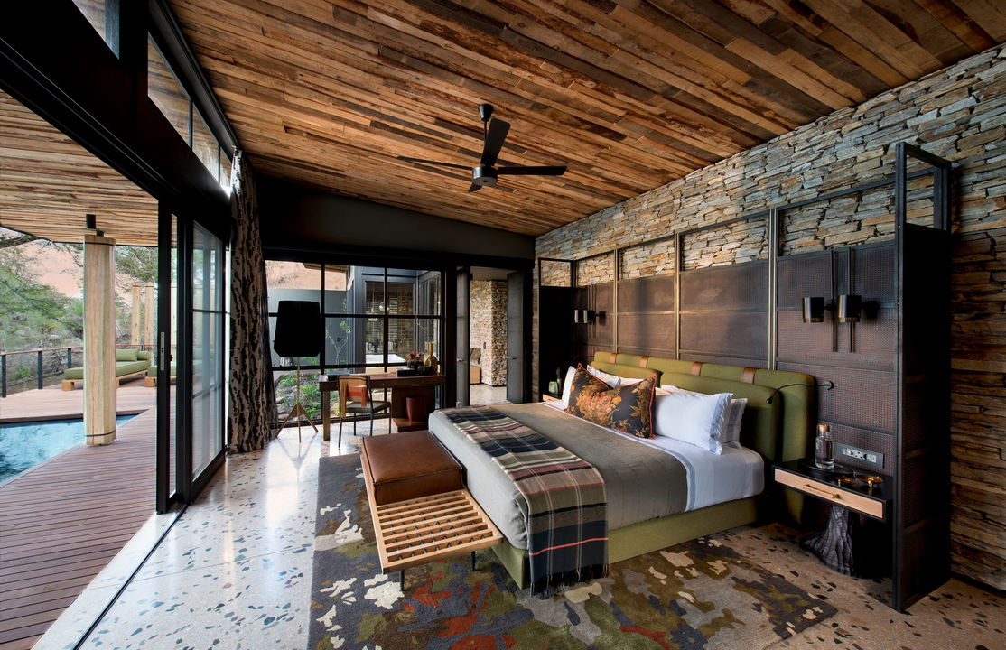side view of bedroom and patio at &Beyond Tengile River Lodge Sabi Sands