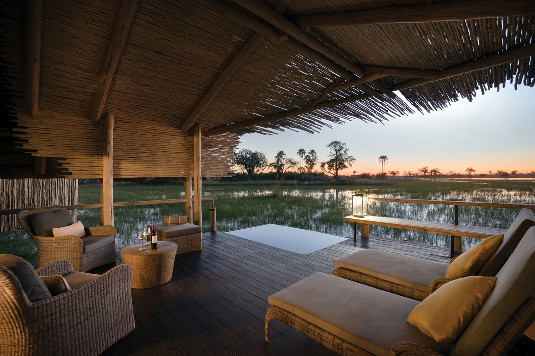 splash pool and loungers on deck of suite by Belmond Eagle Island Lodge