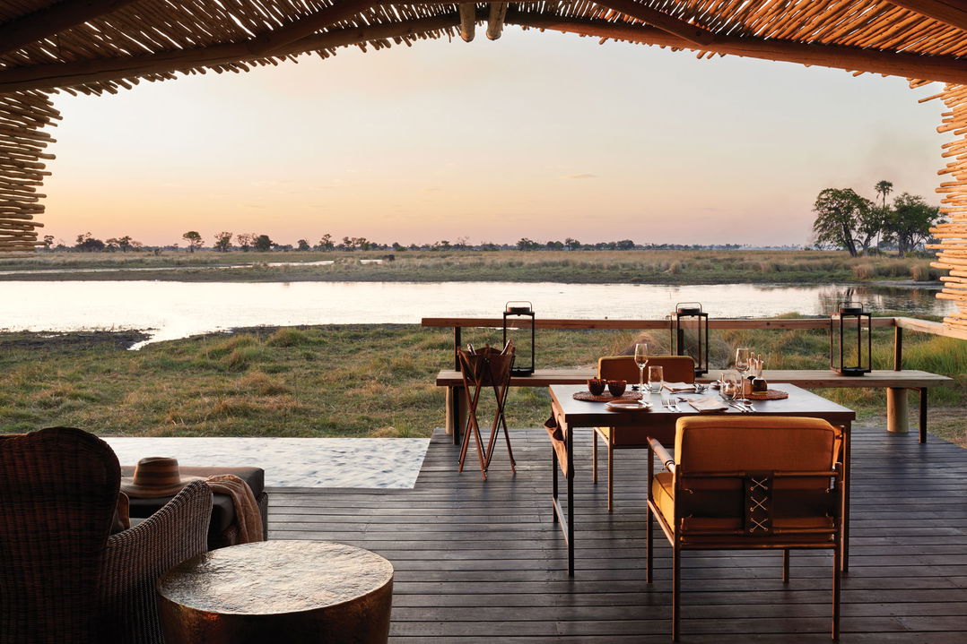 deck view of suite with seating at Belmond Eagle Island Lodge