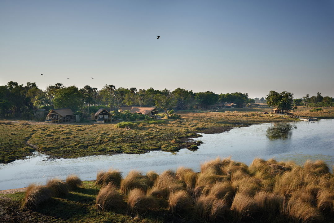 partial aerial view with waters in front of Belmond Eagle Island Lodge