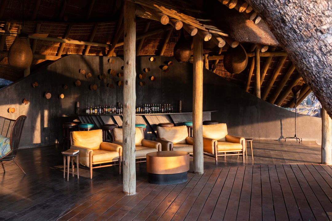 sunlit view of main deck lounge area at Belmond Eagle Island Lodge