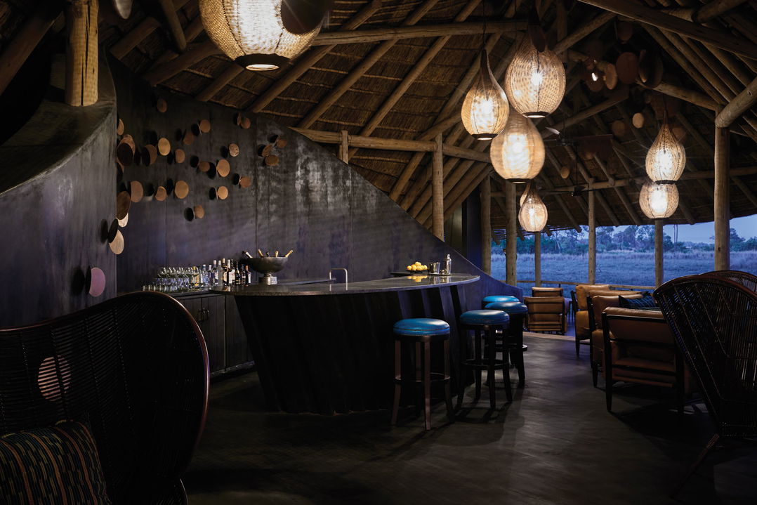 evening view of the bar area at Belmond Eagle Island Lodge