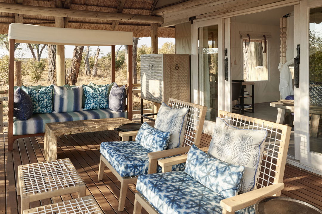 blue viewing chairs in lounge area of Savute elephant lodge Botswana