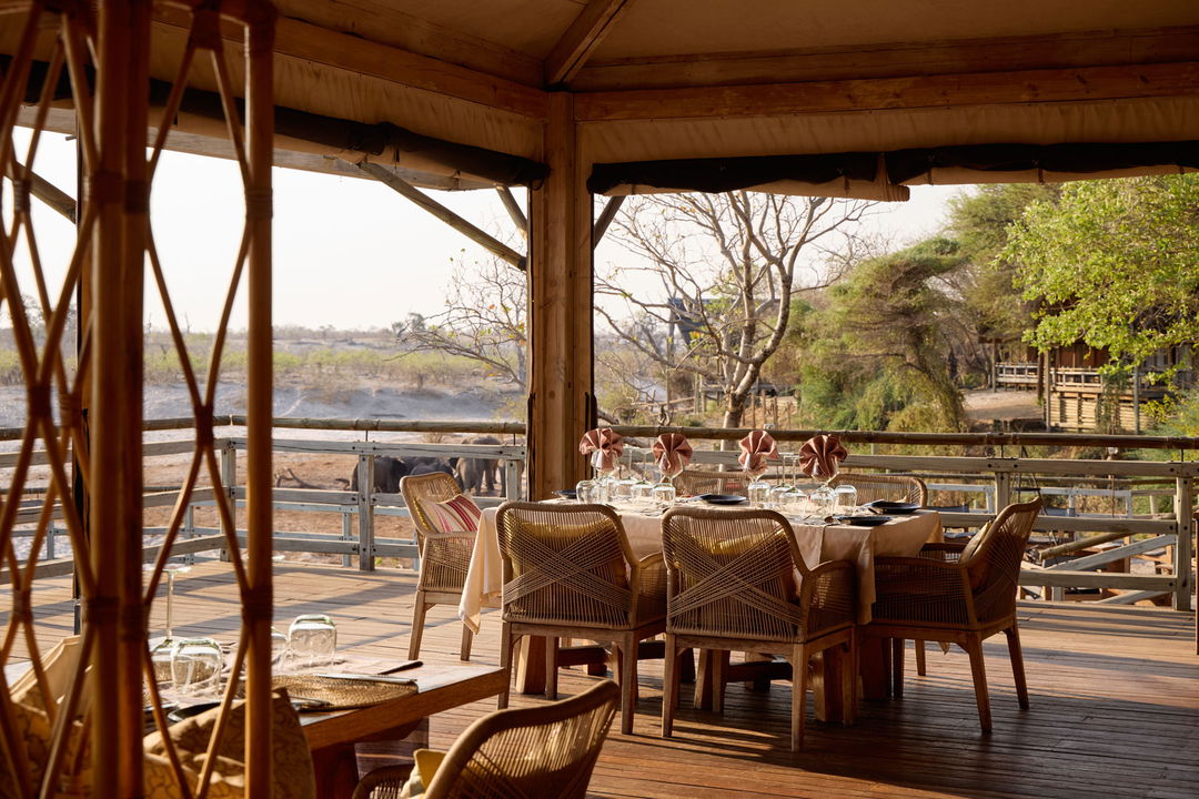 morning view of deck and chairs set for breakfast at Savute elephant lodge Botswana