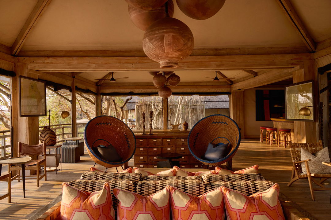 main lounge of Savute elephant lodge Botswana with decorative African chairs