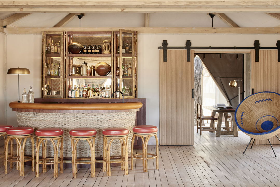 bar with chairs at Savute elephant lodge 