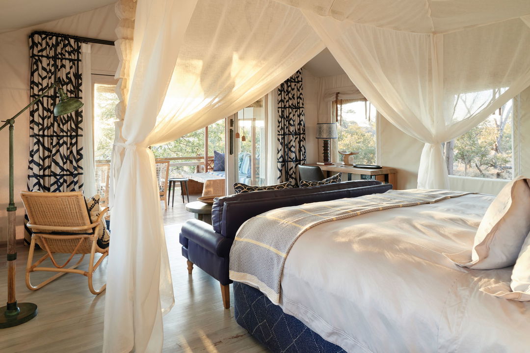 view form bed in luxury room at Savute lodge by Belmond Botswana