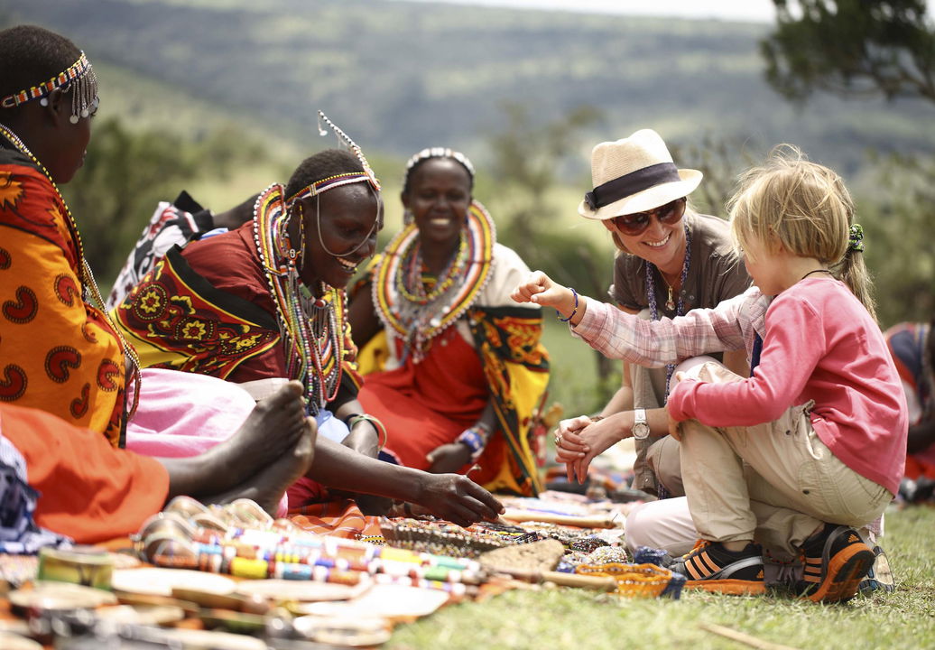 guests on a community visit of andBeyond Kichwa Tembo Camp Kenya Masai Mara