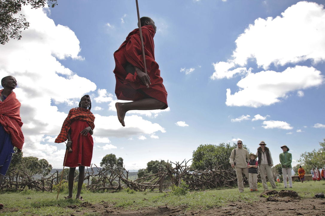 jumping Masai men at andBeyond Kichwa Tembo Camp Kenya Masai Mara