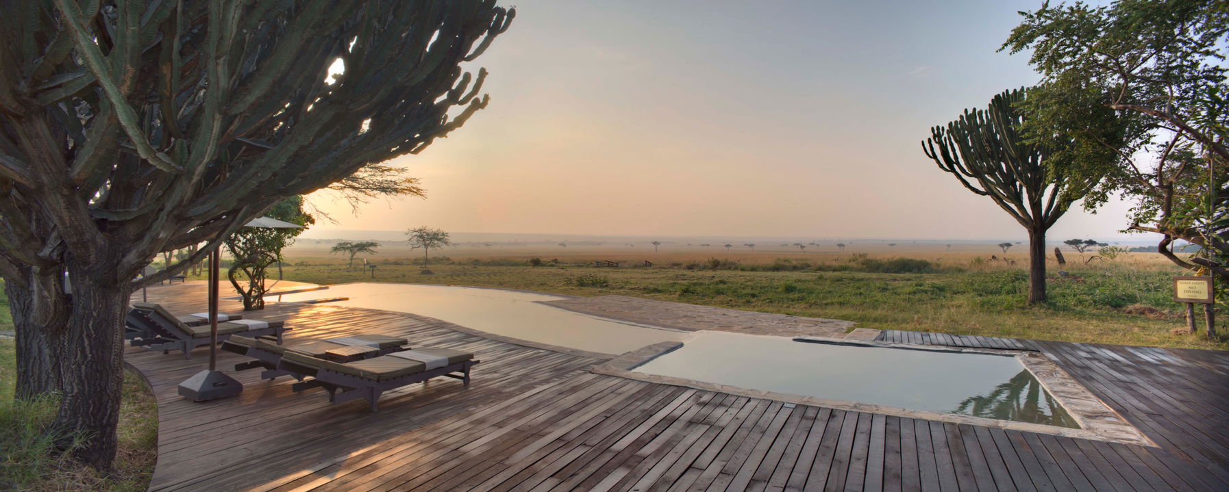 pool deck at sunset by andBeyond Kichwa Tembo Camp Kenya Masai Mara