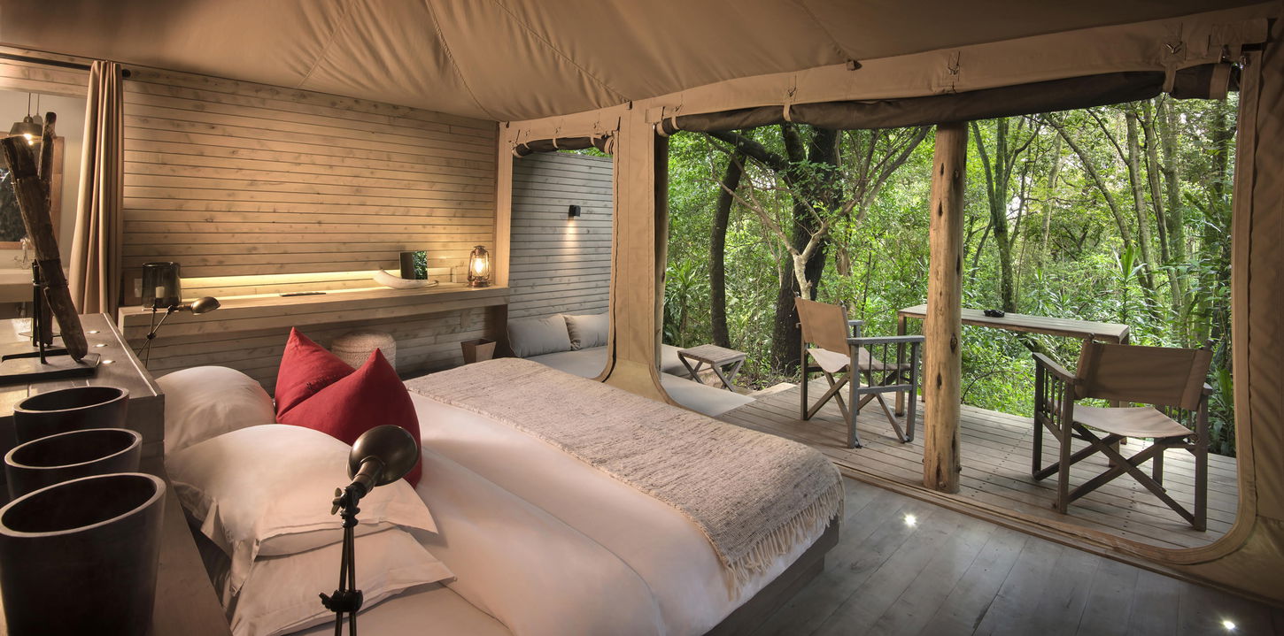 forest view tent suite bedroom at andBeyond Kichwa Tembo Camp Kenya Masai Mara