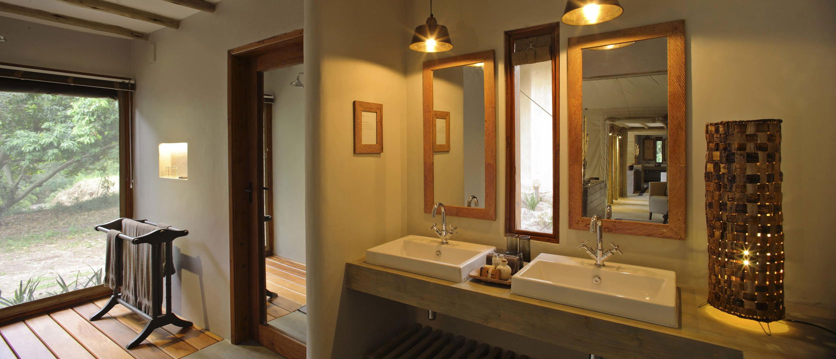vanity in bathroom of tented suite at andBeyond Kichwa Tembo Camp Kenya Masai Mara