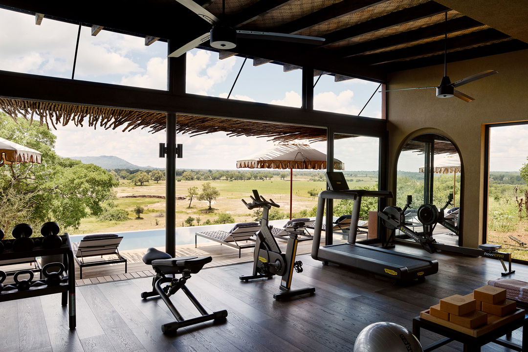 gym facilities overlooking plains at Chichele Presidential Camp Zambia