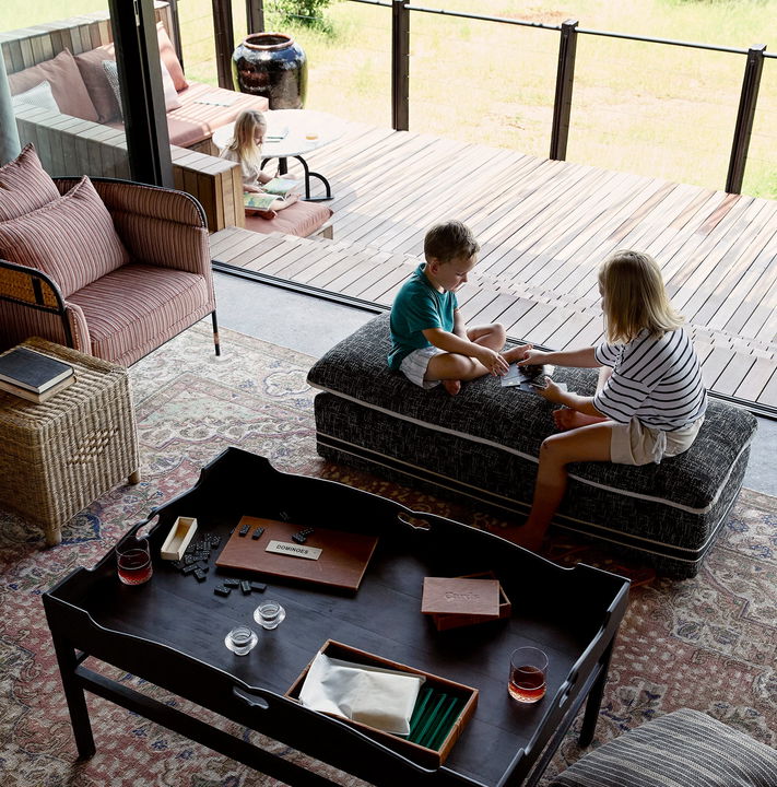 kids playing in the lounge area of Chichele Presidential Camp Luangwa Plains Zambia
