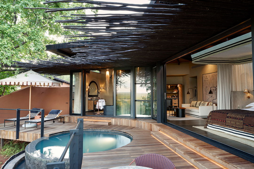 splash pool on deck of vista suite at Chichele Presidential Camp Zambia