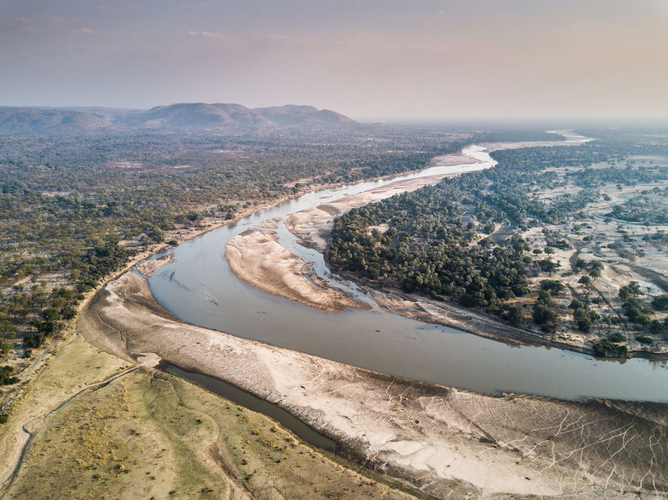 aeriel view of the Luangwa river running through camp by Puku Ridge Camp Zambia
