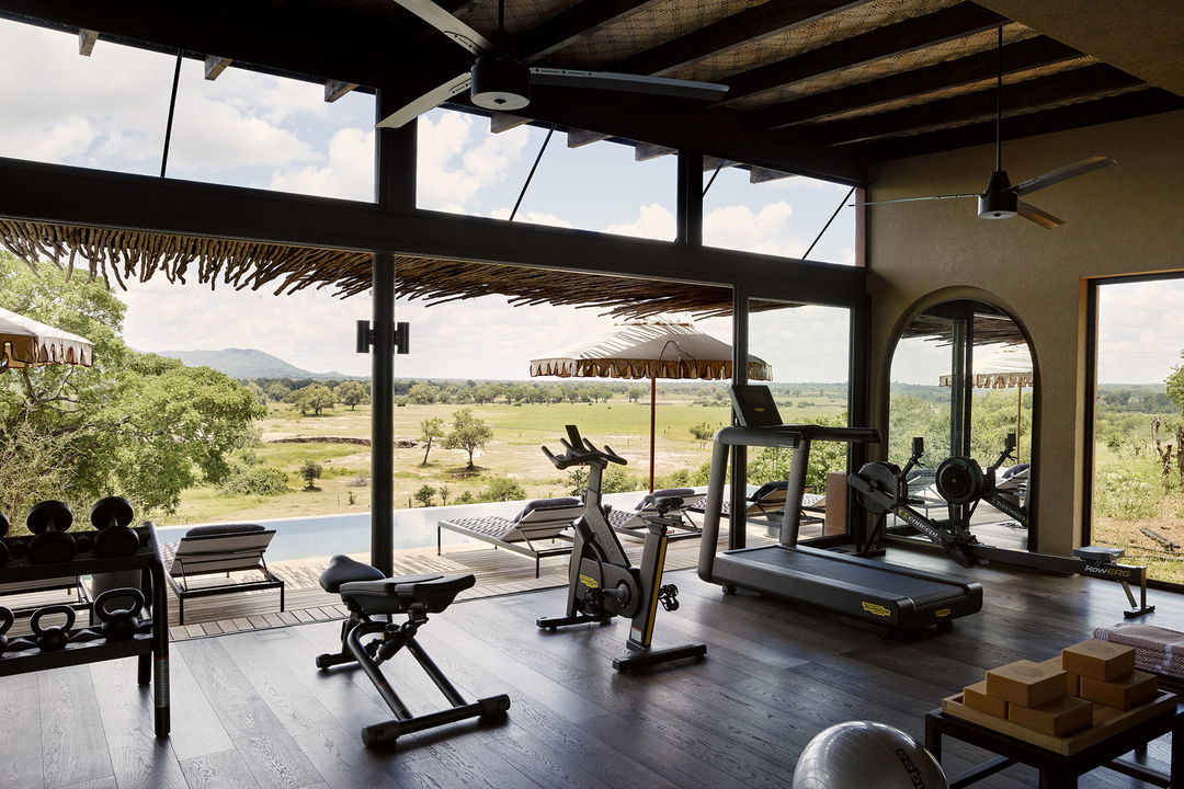 gym facilities overlooking plains at Chichele Presidential Camp Zambia