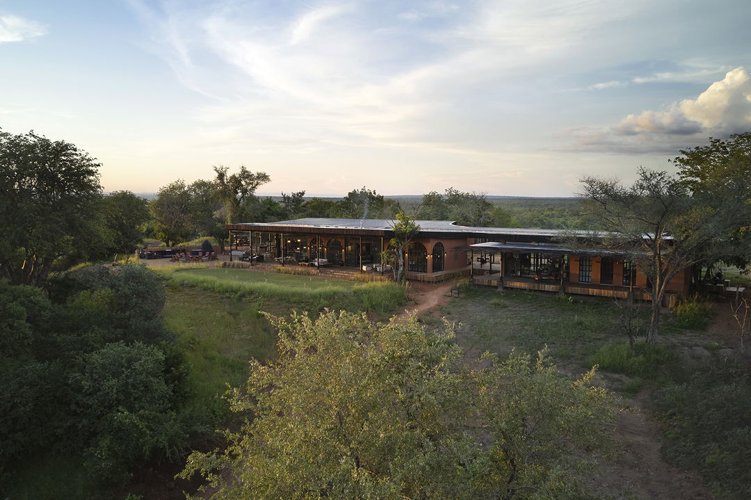 elevated outside view of main lodge by Chichele Presidential Camp Zambia