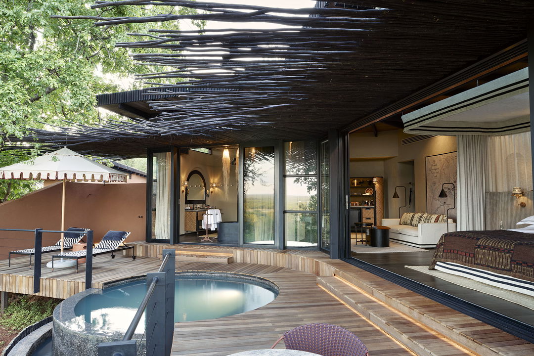 splash pool on deck of suite at Chichele Presidential Camp Zambia