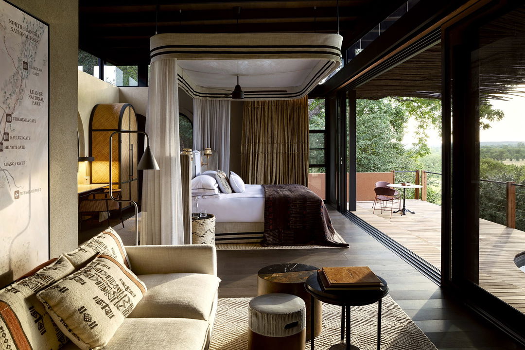 side vew of the lounge in presidential suite by Chichele Presidential Camp Zambia
