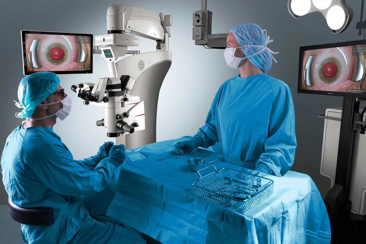 two surgeons performing eye surgery