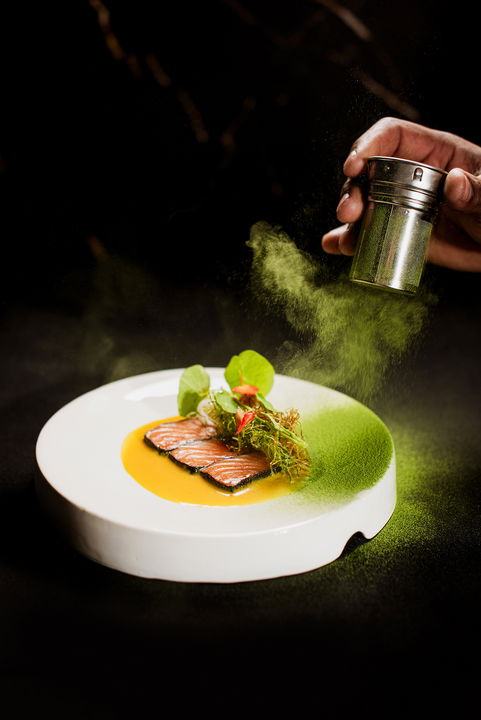 gourmet dish powdered with green wasabi powder from restaurant at Delaire Graff luxury Wine estate in Franshoek