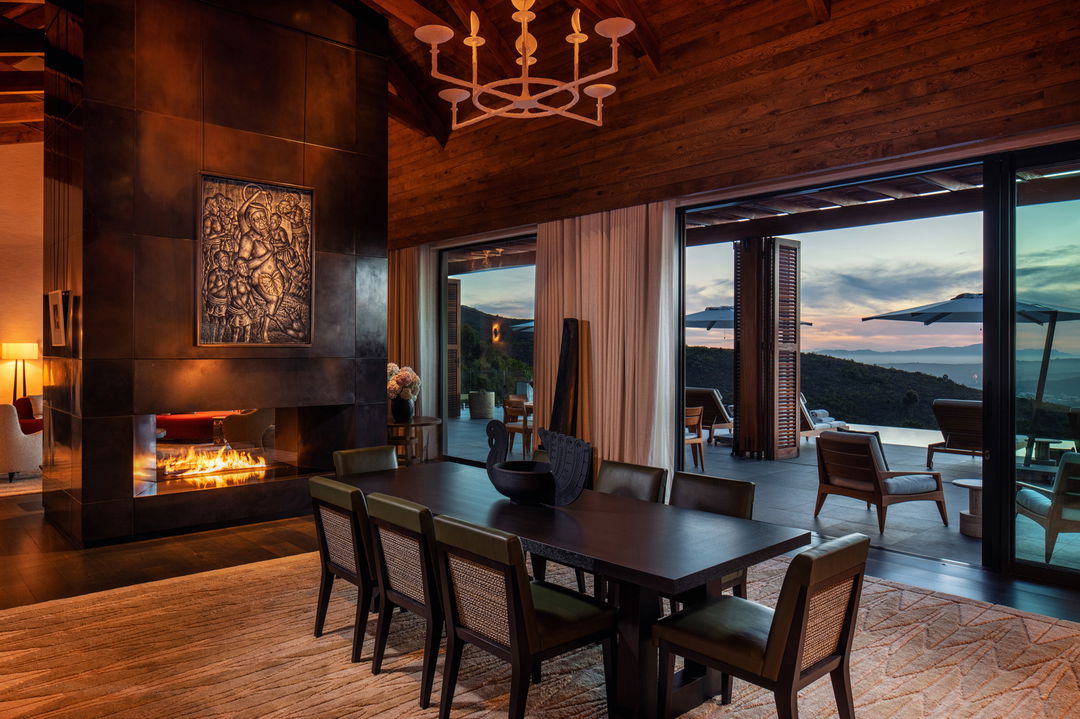 dining table and chairs with views from restaurant at Delaire Graff luxury Wine estate in Franshoek