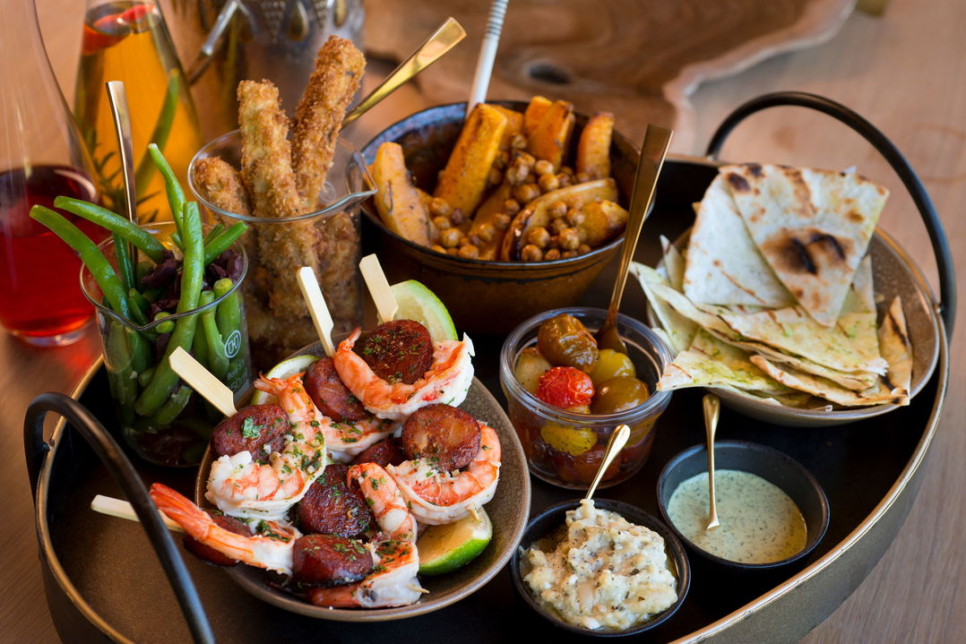 food dishes on table for fine dining at &Beyond Tengile River Lodge Sabi Sands