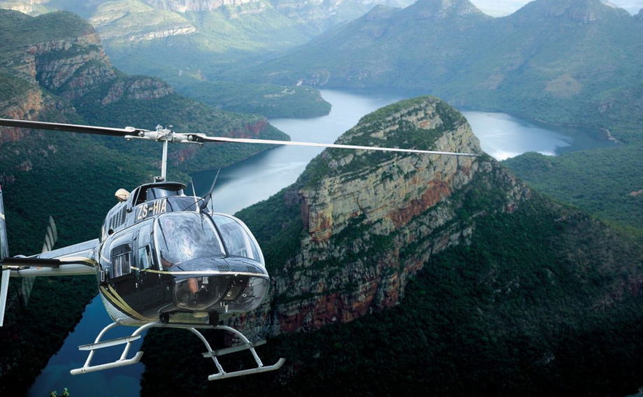 helicopte flying over the blyde river canyon