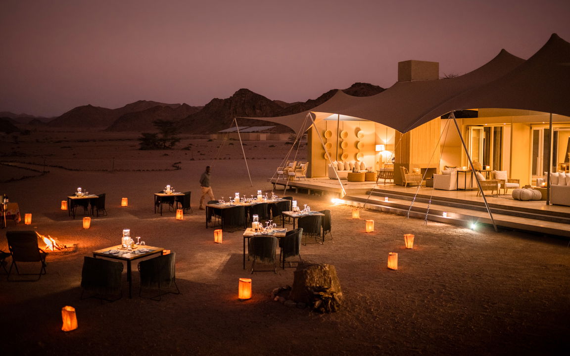night view of dinner setting at Hoanib camp Namibia