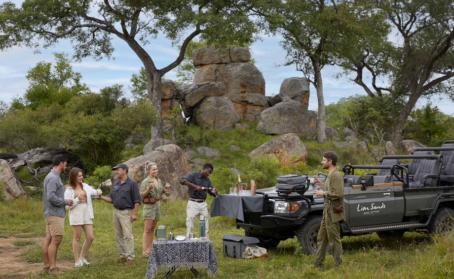 drinks at sunset with guides at Ivory lodge by Lion Sands Game Reserve