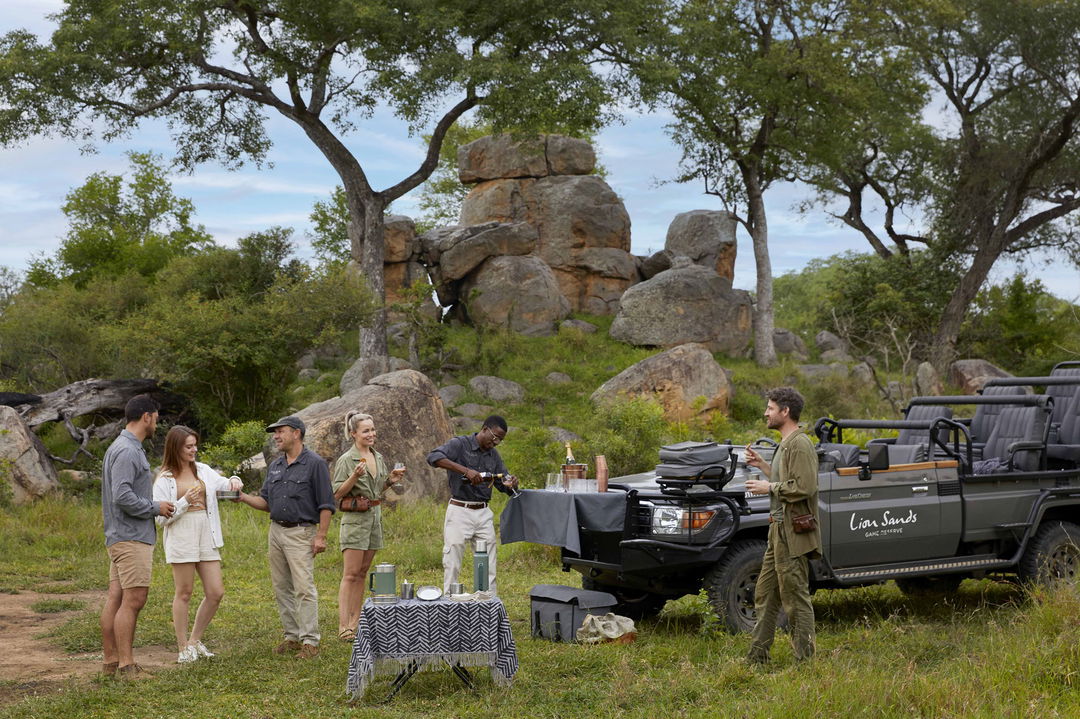 drinks at sunset with guides at Ivory lodge by Lion Sands Game Reserve