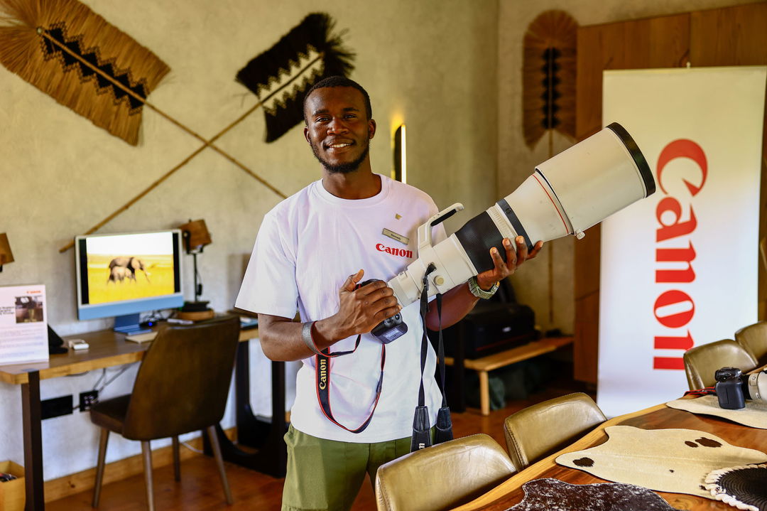 guide with camera in studio of the JW Marriot Masai Mara Kenya