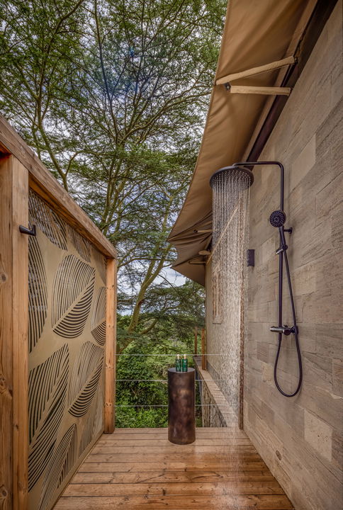 outdoor shower of a family tent at the JW Marriot Masai Mara Kenya
