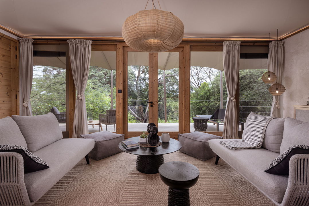 twin lounge interior view of family tent at the JW Marriot Masai Mara Kenya