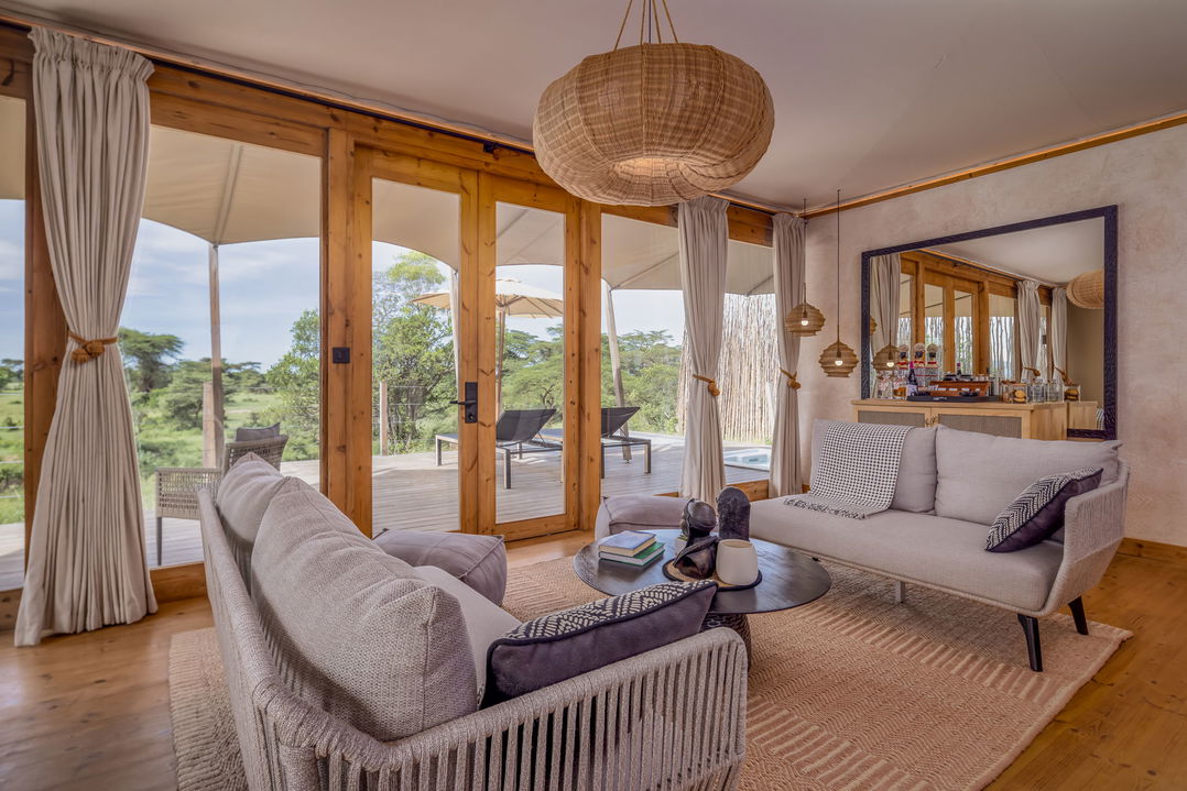 lounge area inside a honeymoon tent at the JW Marriot Masai Mara Kenya