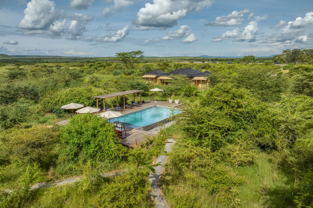 aerial view of the main swimming pool at the JW Marriot Masai Mara Kenya