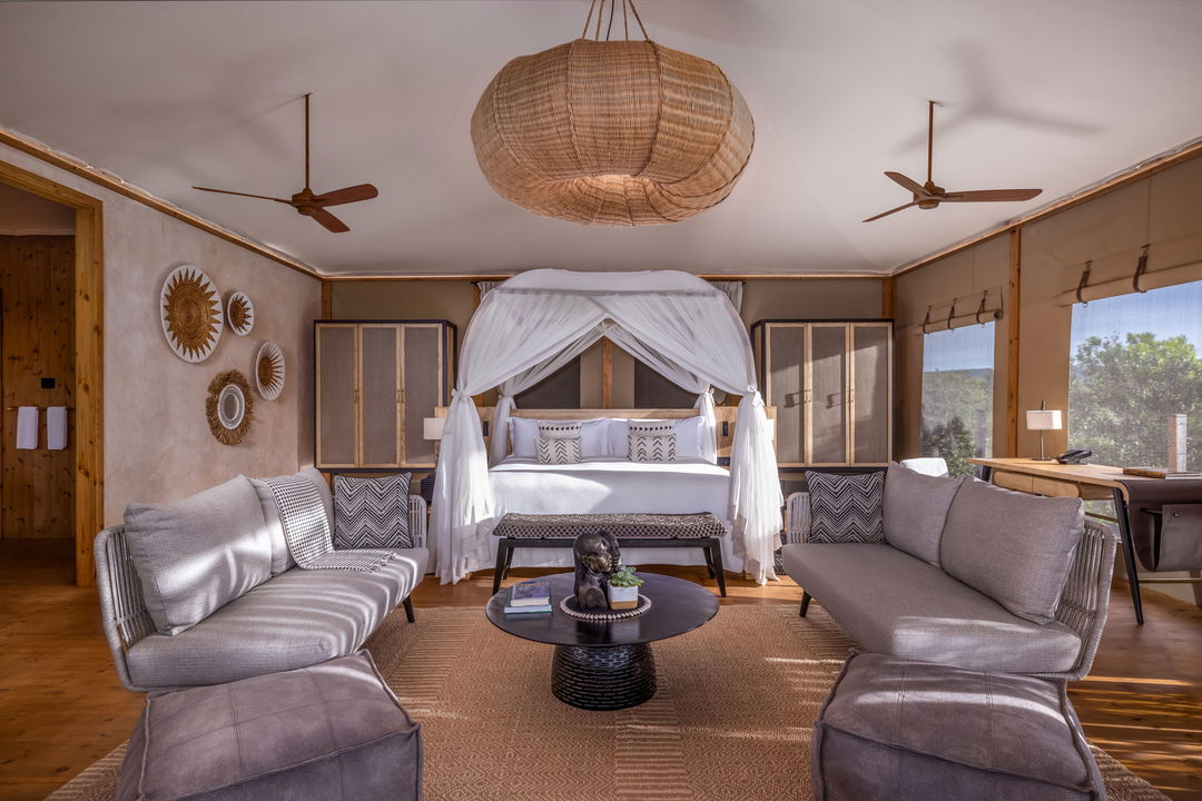 bedroom interior view of a standard king suite at the JW Marriot Masai Mara Kenya