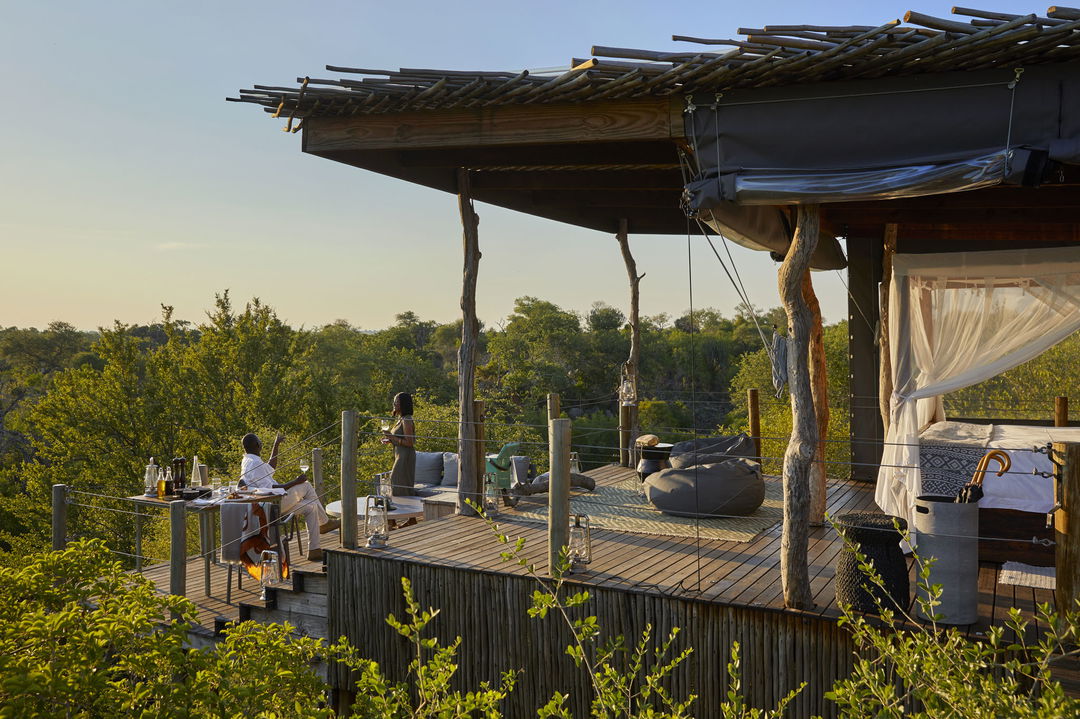 guests on deck of Kingston treehouse Lion Sands Game Reserve