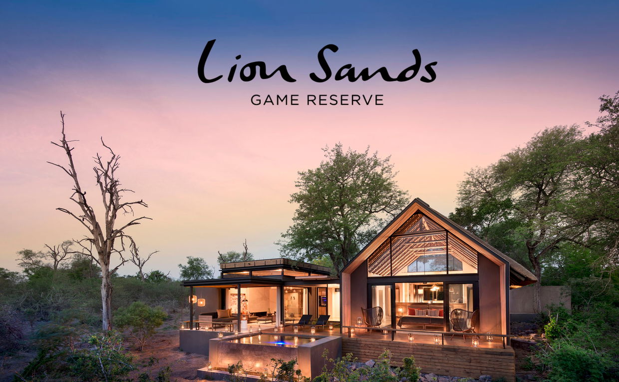 Exterior view of Lion Sands Ivory Lodge Villa at sunset Exterior view of Lion Sands Ivory Lodge Villa at sunset