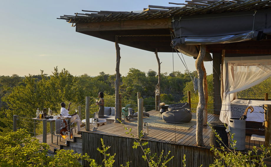guests on deck of Kingston treehouse Lion Sands Game Reserve