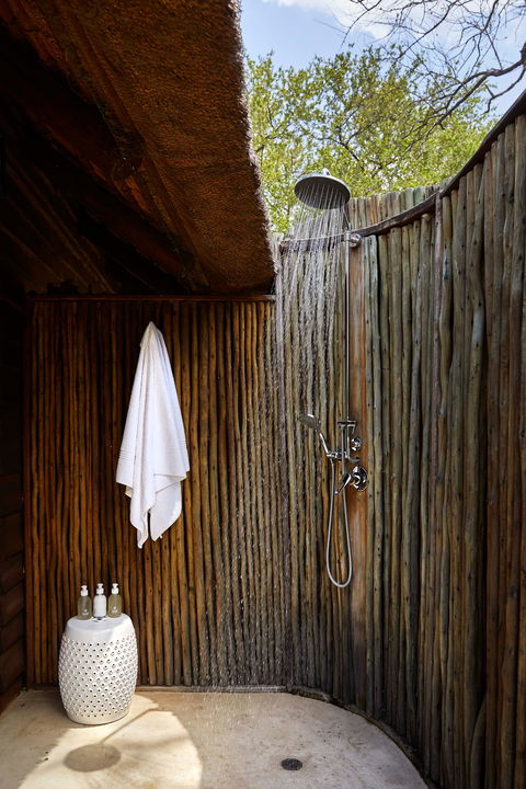 outdoor shower at suite of Narina lodge Lion sands